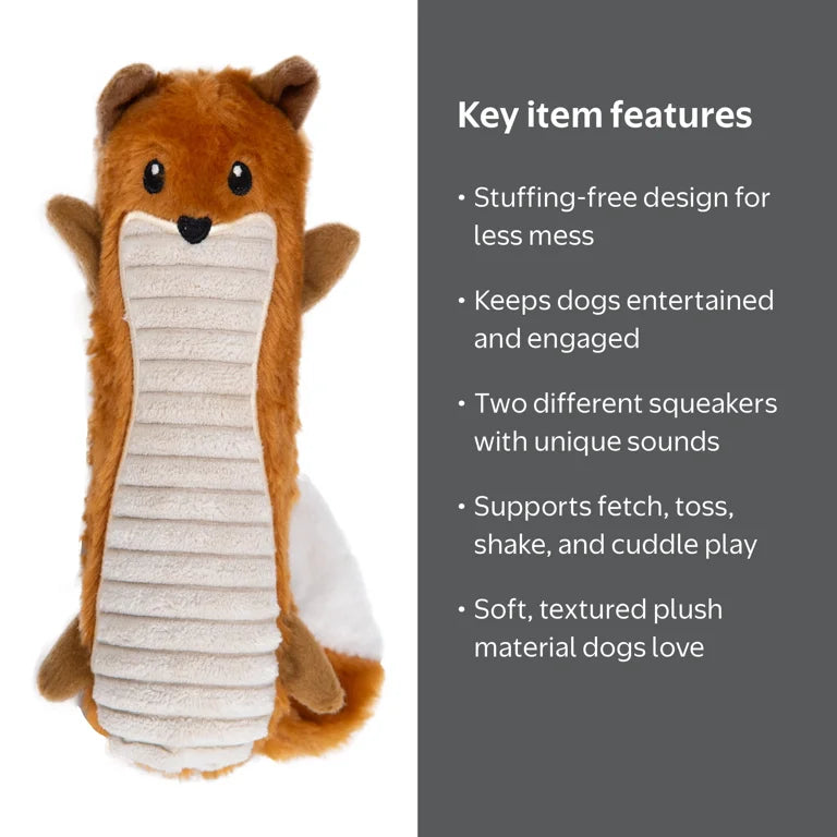 A squeakin good time - Irish setter playing with fox squeaker toy on white rug
